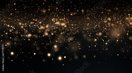 Particules scintillantes et brillantes volant sur fond sombre, noir. Lumière orangée, paillettes dorées et flou. Fond pour bannière, création graphique. © FlyStun