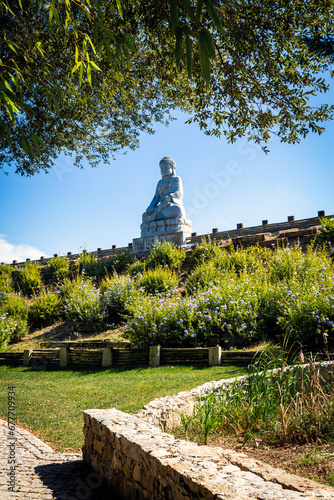 buddha statues in the famous Bacalhoa Buddha Eden Garden in Portugal photo