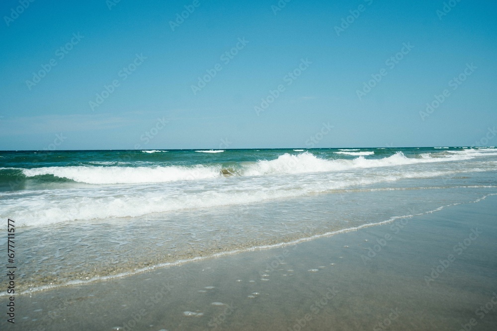 Big waves hitting the seashore Big waves hitting the seashore