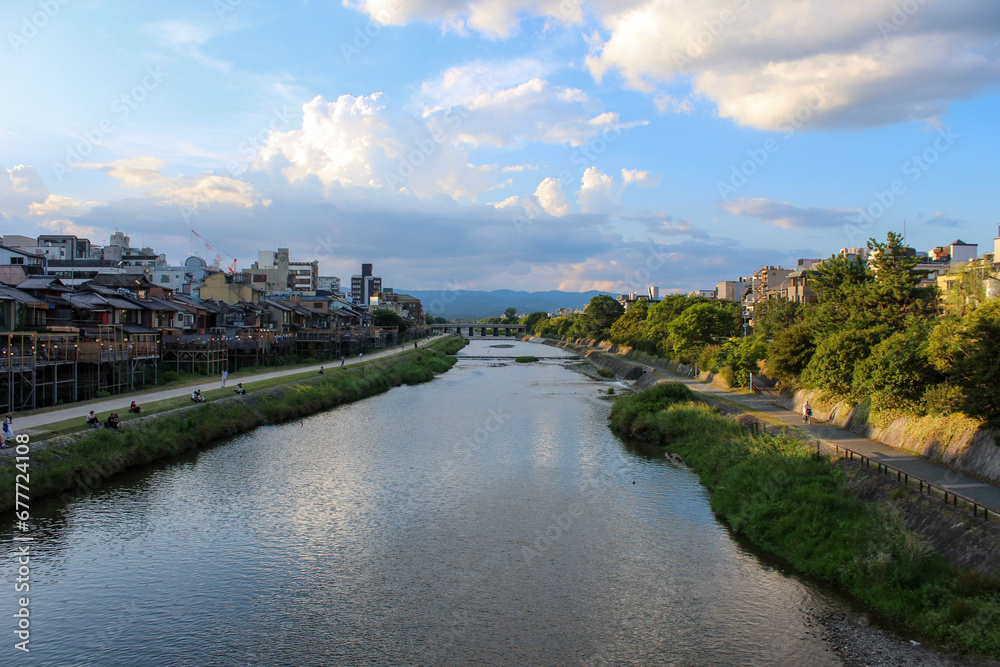 Kamo River, Kyoto, Japan | The River, Late Afternoon with Green Trees, Cloudy Sky, and Mountains in the Distance | Summer | July, 2023