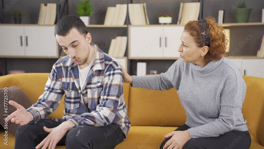 Mother calming her angry son. Mother calming her angry son.