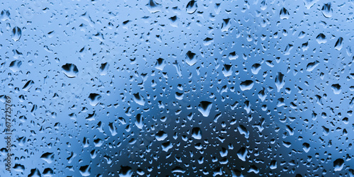 large and fine water drops on glass. banner for website, long wide banner.