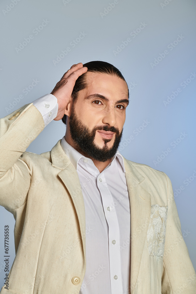 fashionable bearded man in white shirt and blazer posing on grey background, elegant attire fashionable bearded man in white shirt and blazer posing on grey background, elegant attire