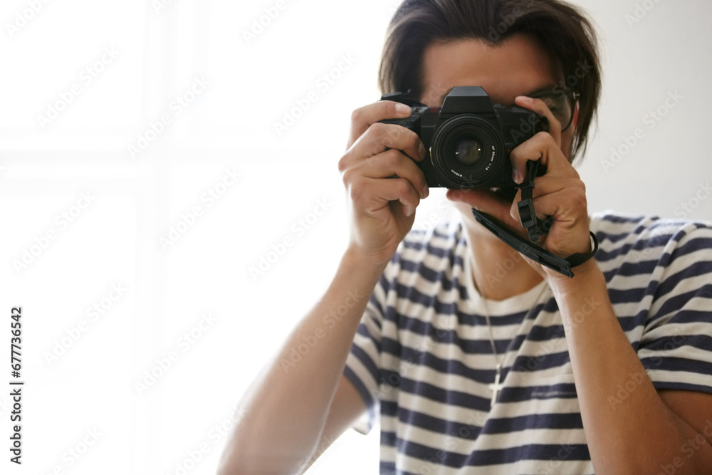 Man, camera and photographer with vision, creative and art in apartment, pictures and inspiration. Male person, confident and photography or lens, vintage technology and retro equipment or gadget Man, camera and photographer with vision, creative and art in apartment, pictures and inspiration. Male person, confident and photography or lens, vintage technology and retro equipment or gadget