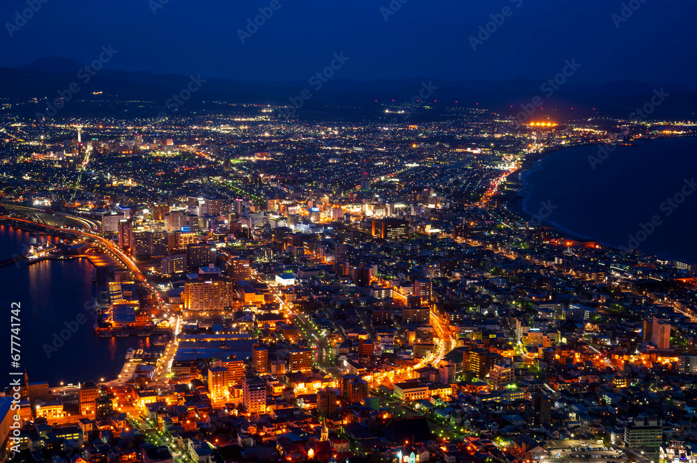 sunset or sun rise of Hakodate cityscape with Skyline and office building and downtown of Hakodate is populars ciy from toursim Hokkaido, Japan with twilight sky in spring season