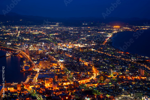 sunset or sun rise of Hakodate cityscape with Skyline and office building and downtown of Hakodate is populars ciy from toursim Hokkaido, Japan with twilight sky in spring season