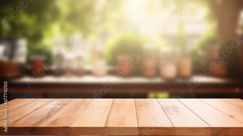 empty wooden table top for product display montages with blurred kitchen view background photo