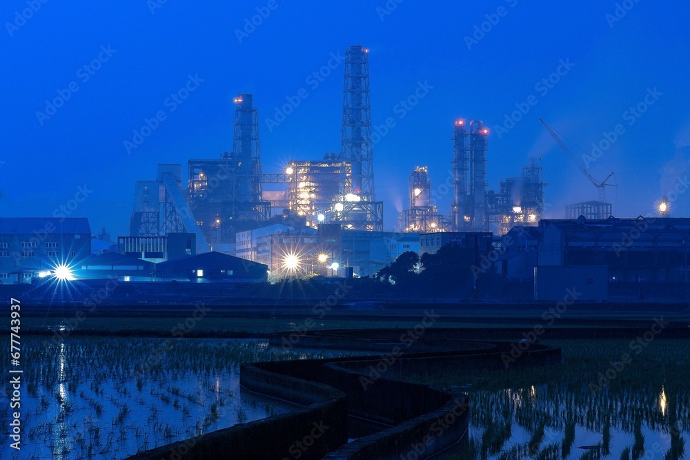 Night view of the industrial area with lighted constructions