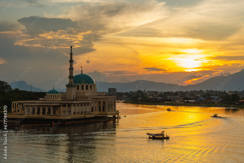 India Mosque Kuching with a view of the waterfront of Sarawak River during sunset. One of the popular tourist attractions in Kuching.
