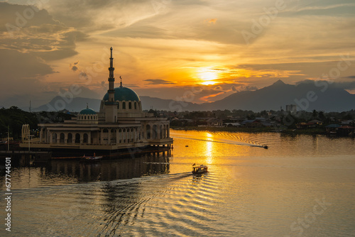 India Mosque Kuching with a view of the waterfront of Sarawak River during sunset. One of the popular tourist attractions in Kuching.