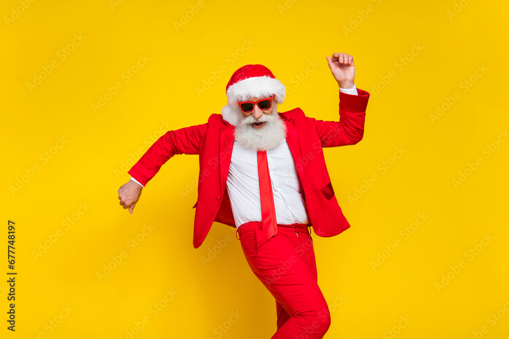 Photo of cool attractive santa dressed red suit tie dancing having fun discotheque isolated yellow color background Photo of cool attractive santa dressed red suit tie dancing having fun discotheque isolated yellow color background