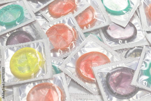 Colorful condoms background.