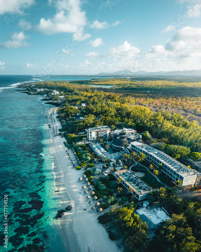 Aerial view of a hotel resort along the coastline on the beachfront in Poste Lafayette, Flacq District, Mauritius. photo