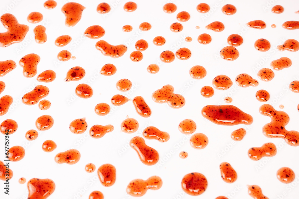 Red jam splashes isolated on a white background. Red jam splashes isolated on a white background.