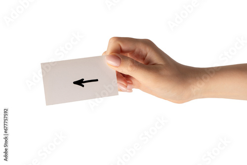 Arrow sign on a card in a woman hand isolated.