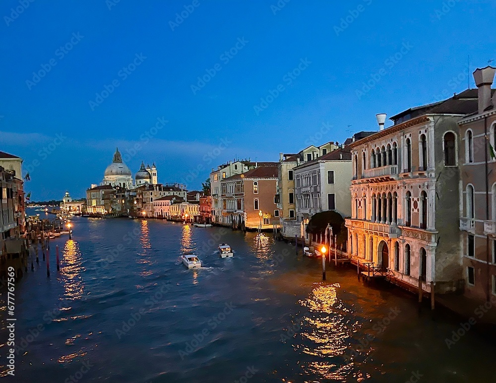 Venice grand canal in night with beautiful colours reflection 
