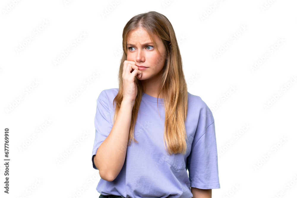 Young beautiful woman over isolated background is a little bit nervous Young beautiful woman over isolated background is a little bit nervous