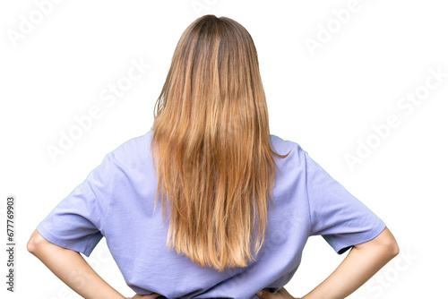 Young beautiful woman over isolated background in back position