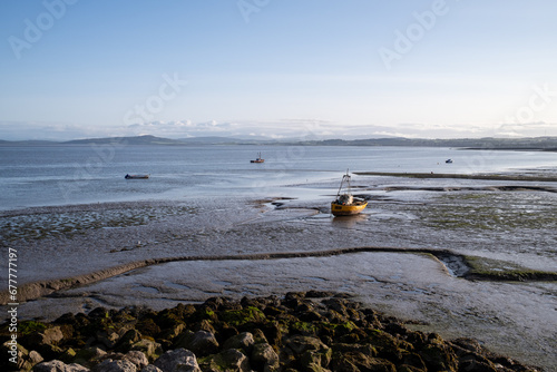 Boats at Morecambe Bay, England photo