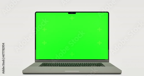 Empty Green Screen Display Laptop for Watching and Paste Background e Business Blog or Gaming App. Copy 3d Pc with Clear Chroma Key for Mockup. Concept Computer Technological on Video Call Close-Up 4k