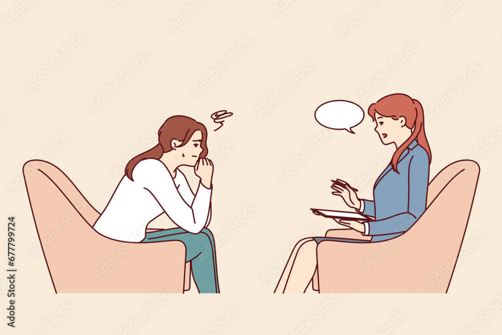 Woman consults psychologist to get rid of mental problems, sits in chair opposite psychotherapist. Upset girl with depression arising from unsuccessful romantic relationship visits psychologist Woman consults psychologist to get rid of mental problems, sits in chair opposite psychotherapist. Upset girl with depression arising from unsuccessful romantic relationship visits psychologist