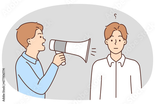 Man with megaphone shout at frustrated male