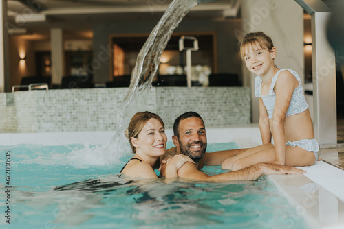 Family in the indoor swimmi...