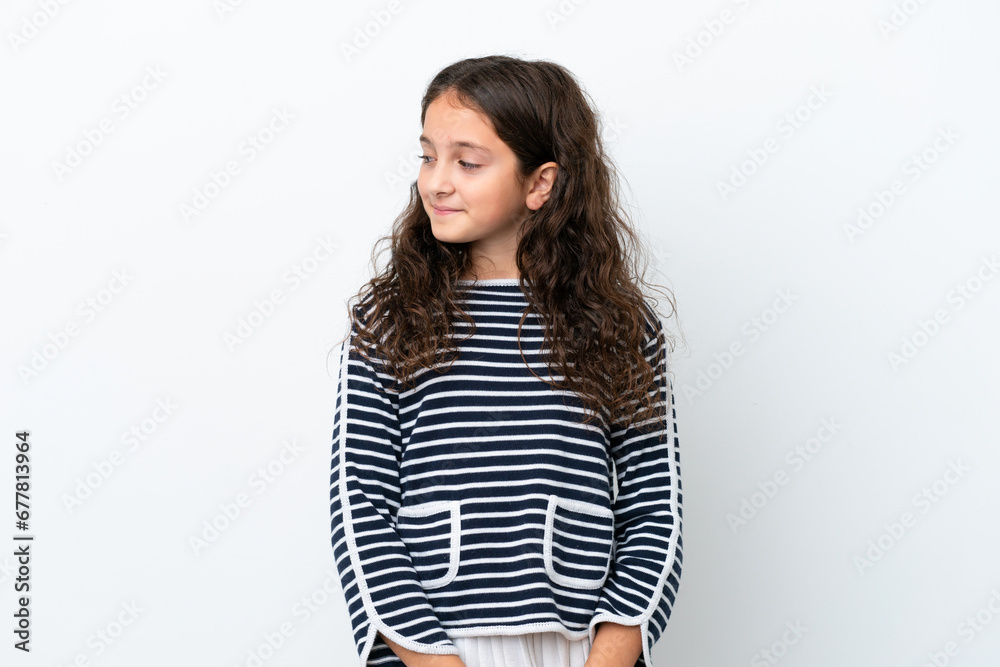 Little caucasian girl isolated on white background looking side Little caucasian girl isolated on white background looking side