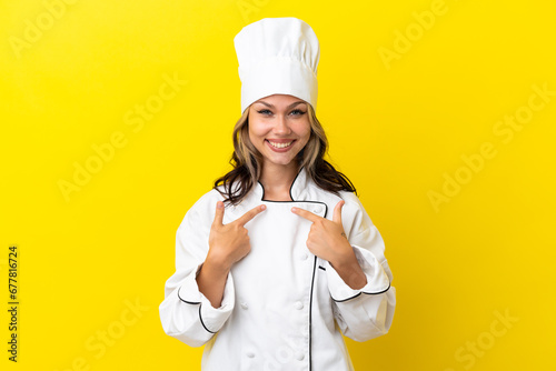 Young Russian chef girl isolated on yellow background with surprise facial expression