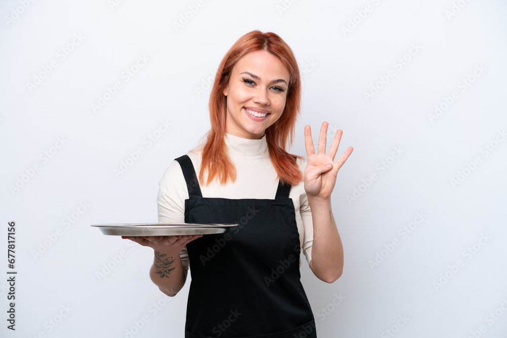 Young Russian waiter with tray isolated on white background happy and counting four with fingers Young Russian waiter with tray isolated on white background happy and counting four with fingers