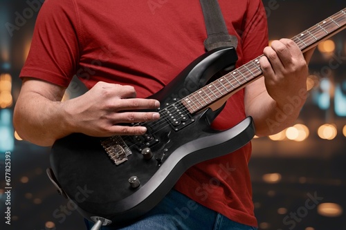 Photos A Musician Playing on Traditional Instrument Guitar