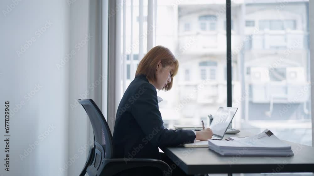 Female secretary worker working on office desk searching about data paper. Female secretary worker working on office desk searching about data paper.