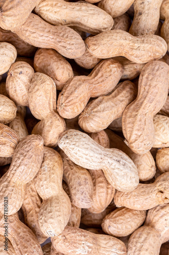 Peanuts in shell on a white...