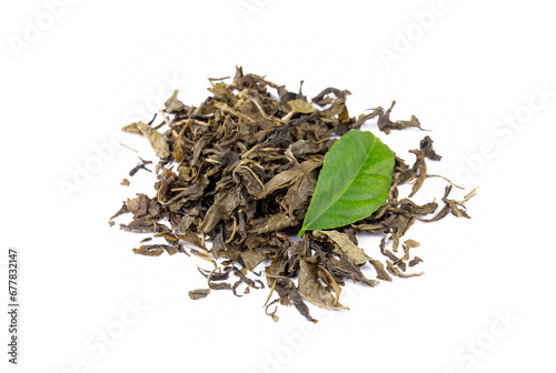 Dried green tea on the whit...