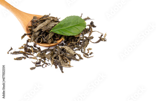 Dried green tea on the whit...