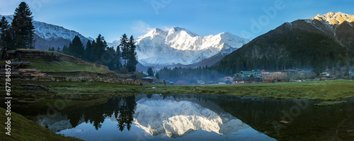 Fotografie Panorama of Nanga Parbat reflected in a pond at Fairy Meadows