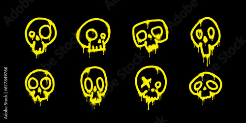 Spray paint. Abstract yellow skulls with paint drips on a black background. Skeleton head silhouette set in grunge style. Street art isolated elements. Graffiti or tattoo concept. Vector illustration.