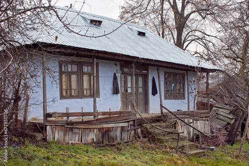 the beautiful house in the country with flowering trees in spring in Romania