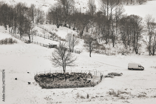 Obraz na płótnie rural winter landscape in the hill area with households and human activities w salonie