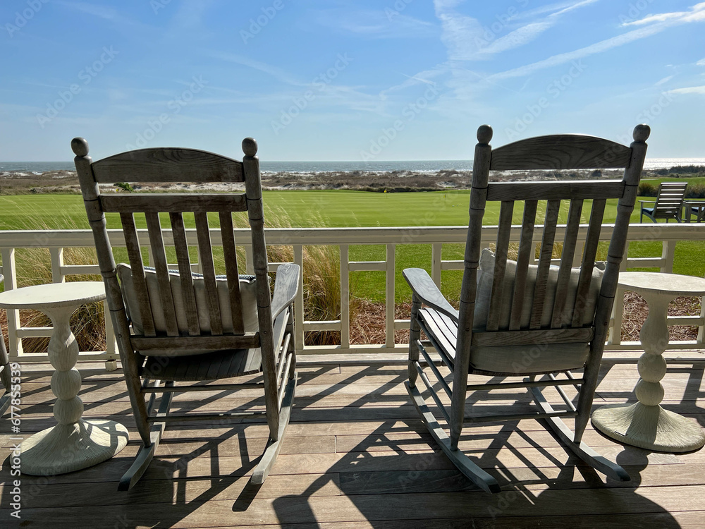 Fototapeta premium Rocking chairs overlooking the Ocean Course Golf Course on Kiawah Island in South Carolina.