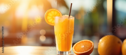 tall glass of freshly squeezed orange juice, radiating with vibrant, citrus hues