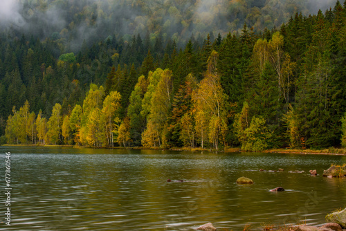 Obraz na płótnie reflections with forest in autumn lake, Sf Ana lake w salonie
