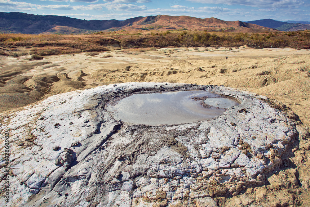 cones of mud volcanoes from which rivers of mud flow