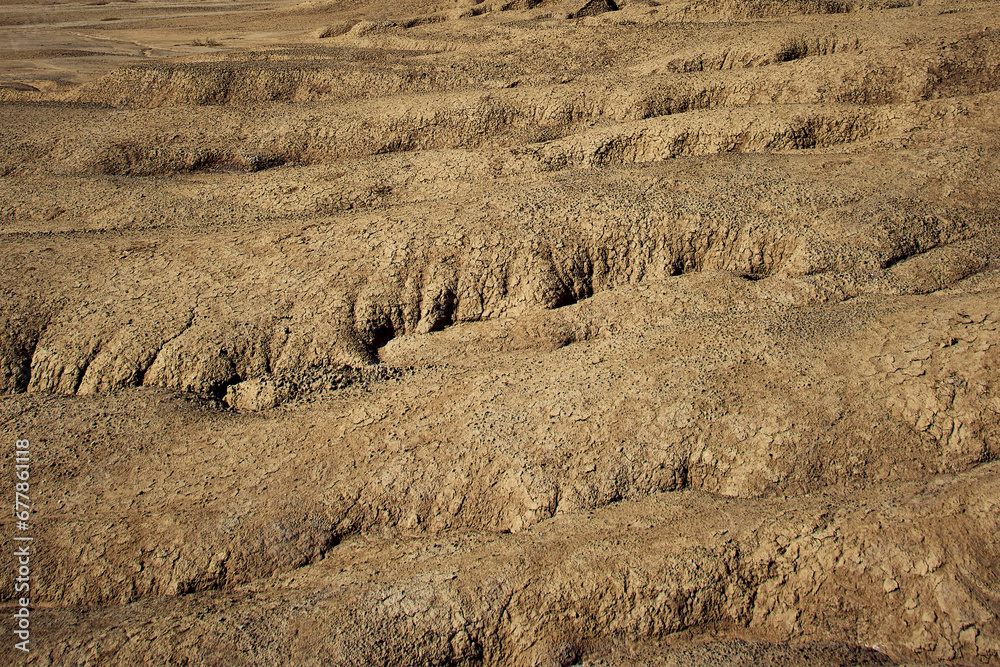 cones of mud volcanoes from which rivers of mud flow
