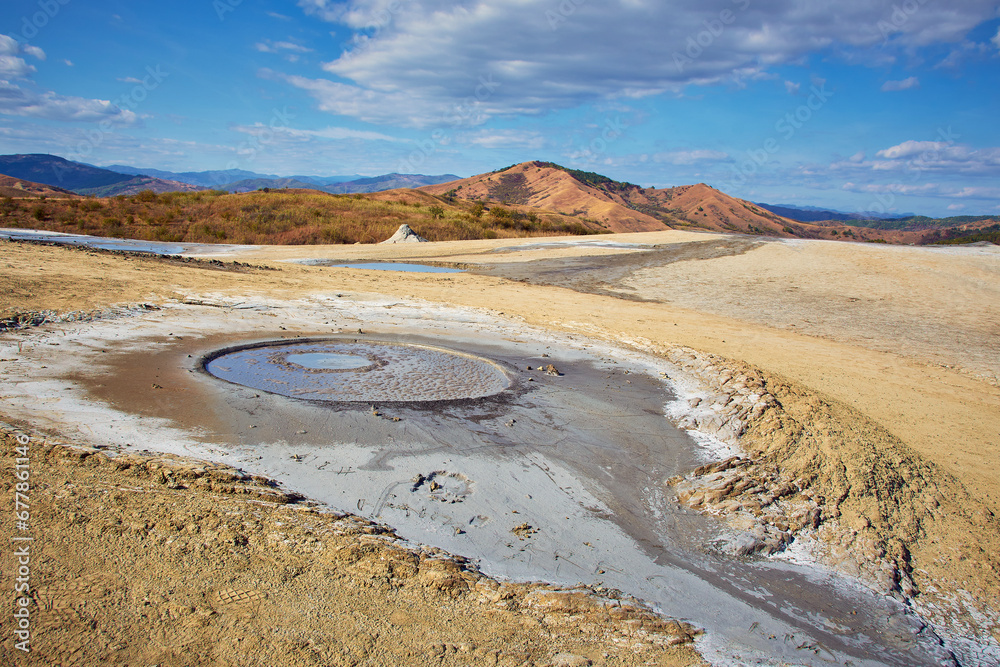 cones of mud volcanoes from which rivers of mud flow