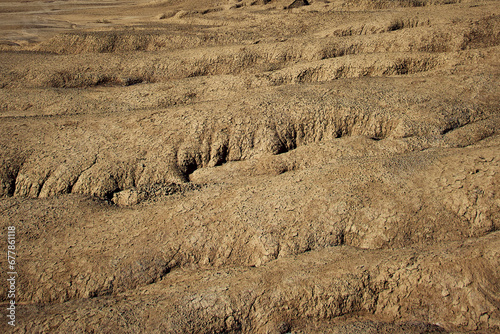 Obraz na płótnie cones of mud volcanoes from which rivers of mud flow w salonie