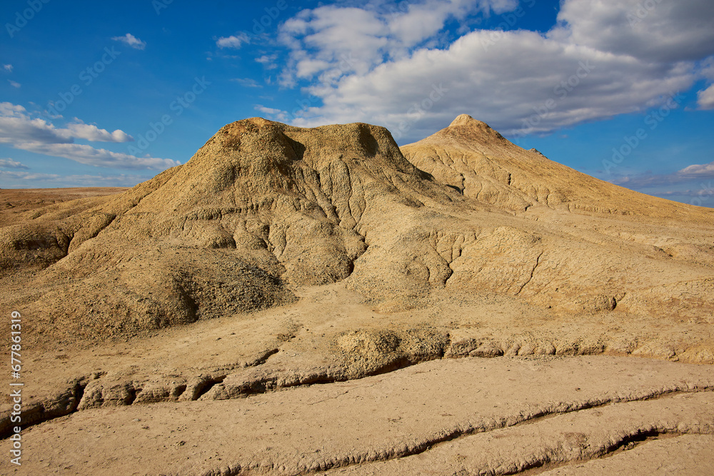 cones of mud volcanoes from which rivers of mud flow
