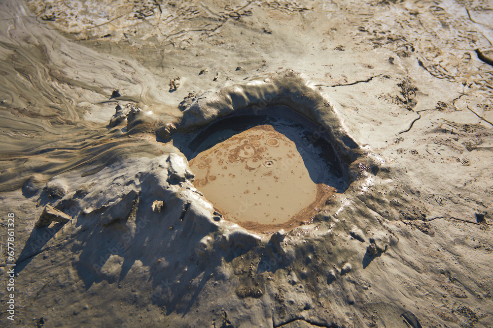 cones of mud volcanoes from which rivers of mud flow