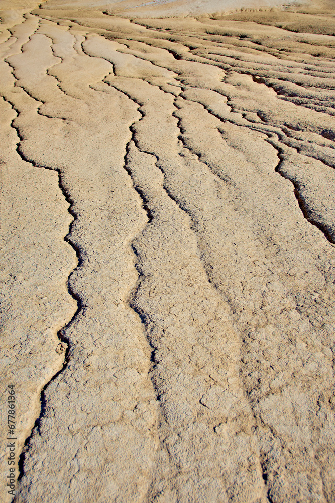 cones of mud volcanoes from which rivers of mud flow
