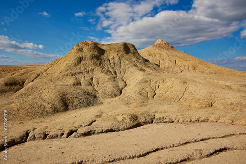 Obraz na płótnie cones of mud volcanoes from which rivers of mud flow w salonie